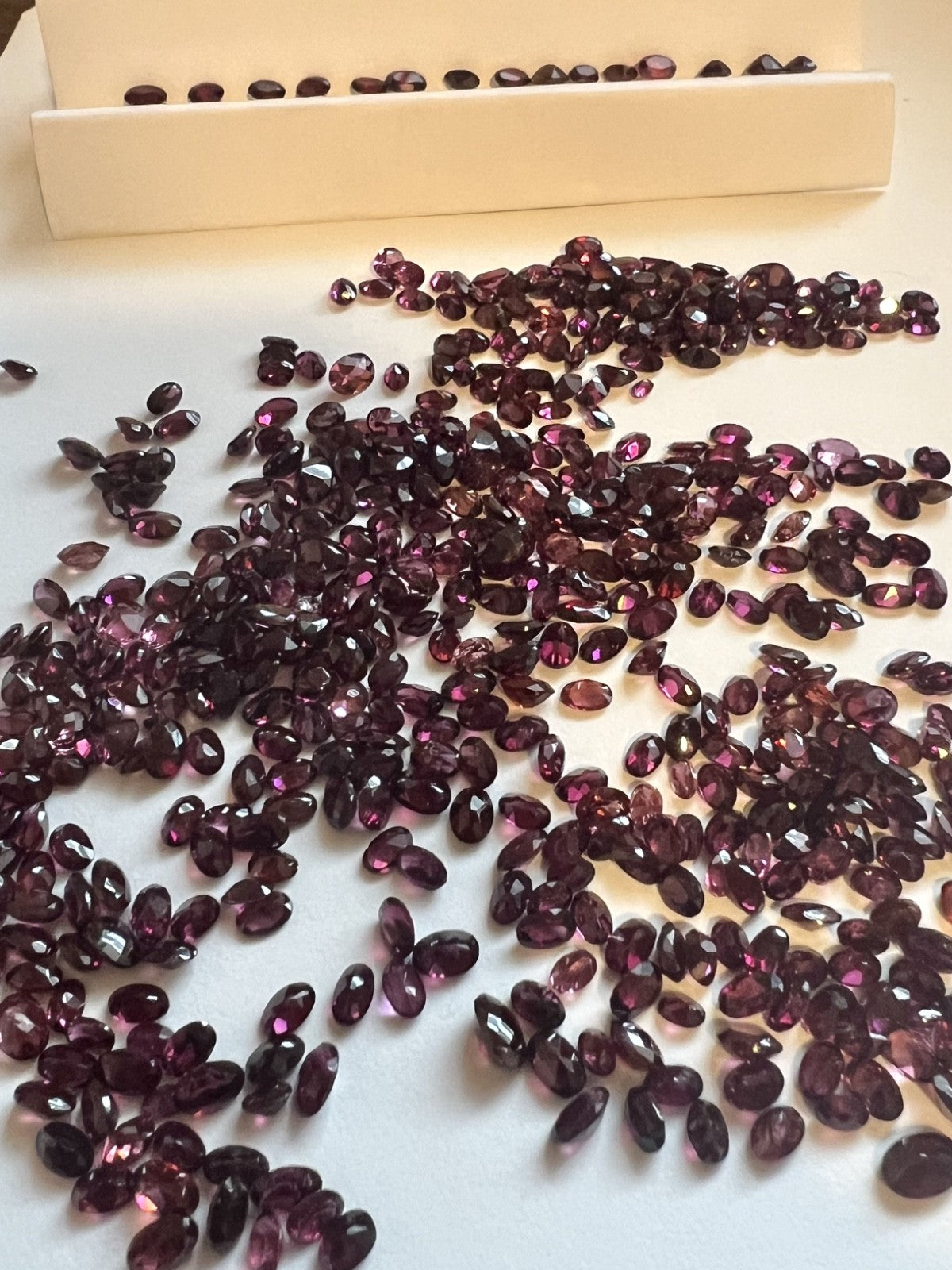 A photo of 100carats of Oval Idaho Rhodolite Garnets 